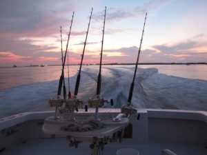 Fishing Poles and Boat Wake